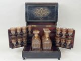 a wooden case with a lot of glasses in it