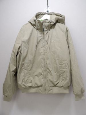 an image of a jacket hanging on a hanger on a wall