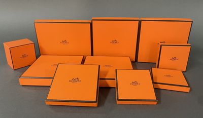 a group of orange boxes sitting on top of a table