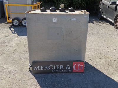 an image of a metal container sitting in a parking lot