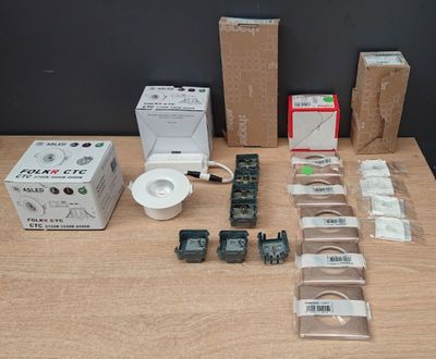a table that has a bunch of electronics on top of it