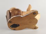 a wooden toy that is shaped like a rabbit