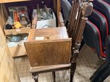 a chair that is sitting in a room with many chairs