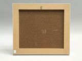 an image of a picture frame with a cork board in it