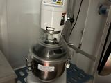 an image of a kitchen with a mixer on a shelf