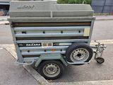 an image of a trailer that is parked on the side of the road