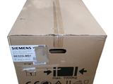 a cardboard box with a sticker on the side of it