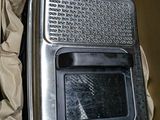 a box with a toaster and a toaster oven inside of it