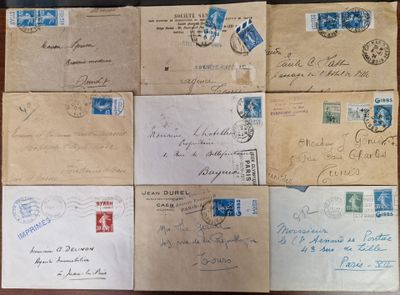 many old envelopes on a table with stamps on them