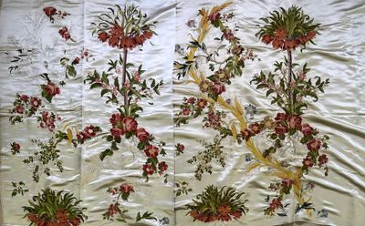 an image of a bed with a floral design on it