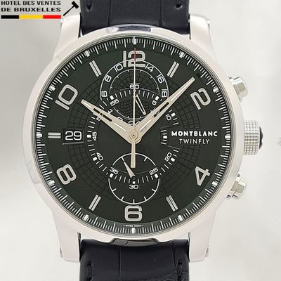 a close up of a watch on a white background