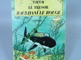 livre pour enfants français, « Les Aventures de Tintin : Le Trissor », mettant en scène une baleine et un poisson