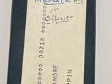 a black and white picture of a card with a name on it