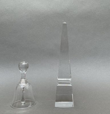 a clear glass bottle and a clear glass bottle on a table