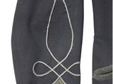 the back of a black jacket with a silver design on it