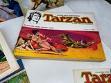 many books on the table with pictures on them