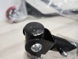 a close up of a pair of black wheels on a table