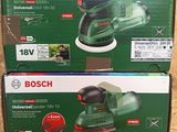 two boxes of bosch orbital sander sitting on a wooden surface