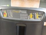 a close up of a chest press with instructions on it