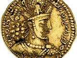 une pièce d'or sur laquelle figurent le visage d'une femme et une couronne