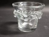 a clear glass cup with a horse design on it
