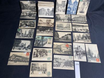 several old black and white photographs of people and buildings on a table
