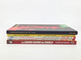 three books stacked on top of each other on a white surface
