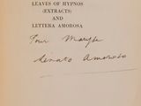 a close up of a book with handwriting on it