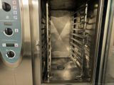an image of a stainless steel oven with a door open
