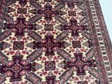an oriental rug with a red and blue design on a blue background
