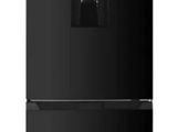 a black refrigerator freezer sitting on top of a white counter