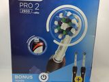 oral - b pro 2 electric toothbrush with bonus brush heads