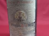 a bottle of wine that is sitting on a table