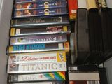 a lot of dvds in a box on a table