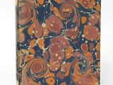 an orange and blue book cover with a pattern of orange and blue swirls