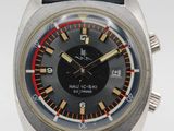 a close up of a watch on a white surface