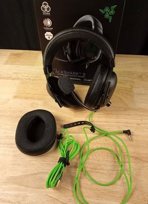 a close up of a pair of headphones on a table