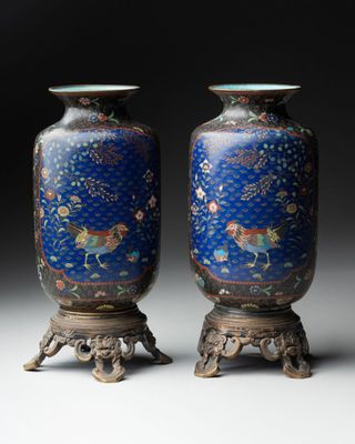 pair of chinese cloissant vases with horses and flowers on blue ground