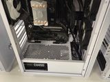 a white computer case sitting on top of a table