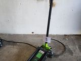 a pair of jacks sitting on the floor next to a wall