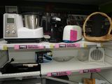 many different appliances on the shelves in the store
