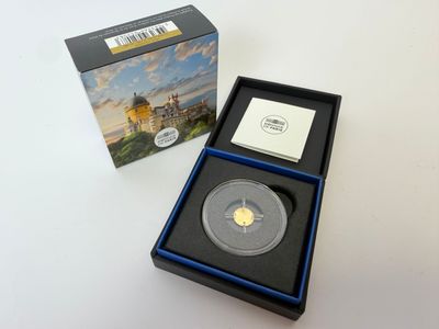 une image représentant une pièce d'or dans une boîte accompagnée d'une carte