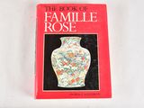 the book of famille rose is on a white surface