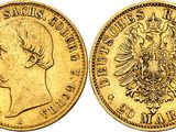 an image of a gold coin with the head of a woman