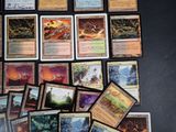 a lot of cards on the table with a lot of them