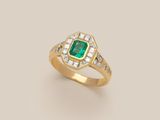 an emerald and diamond ring