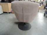 a chair that is sitting in the middle of a room