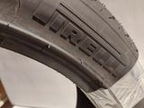 a close up of a tire with a sticker on it