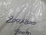 a bag of toilet paper that has been wrapped in plastic