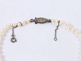pearl necklace with a silver clasp and a pearl bead bracelet